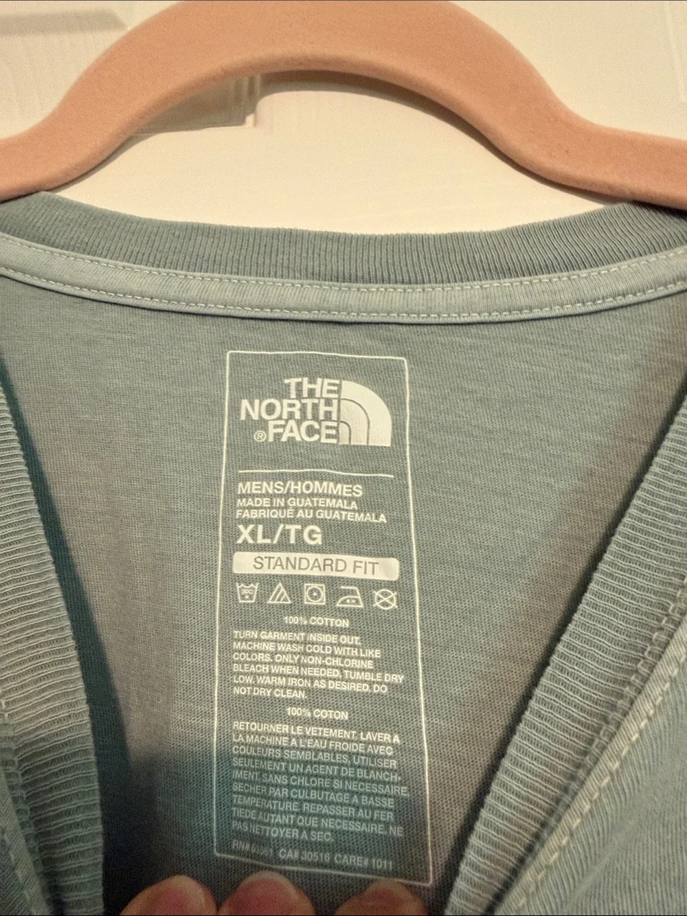 The North Face Sage Green Tee with Navy 'Never Stop Exploring' Print